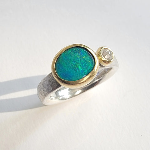 Bright opal and grey diamond ring